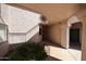 The shady entry to this unit features desert landscaping with a sidewalk leading to the front door at 9151 W Greenway Rd # 162, Peoria, AZ 85381