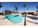 Large community pool with lounge chairs and shaded areas for relaxing and enjoying the outdoors at 9151 W Greenway Rd # 162, Peoria, AZ 85381