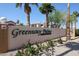 Welcome to Greenway Palms Condominiums, beautifully landscaped with vibrant flowers and mature trees at 9151 W Greenway Rd # 162, Peoria, AZ 85381