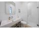 Bright bathroom featuring modern sink, toilet and glass shower at 10152 E Phantom Way, Scottsdale, AZ 85255