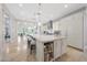 Spacious kitchen with large island, stone countertops, and stainless steel appliances at 10152 E Phantom Way, Scottsdale, AZ 85255