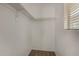 This walk in closet features a shelf and hanging bar for organization at 10370 W Sands Dr # 463, Peoria, AZ 85383