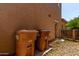Exterior of home with trash bins to the side of the structure at 10370 W Sands Dr # 463, Peoria, AZ 85383