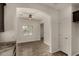 The bright living room includes wood flooring and a view into the kitchen and entry at 10370 W Sands Dr # 463, Peoria, AZ 85383