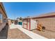 This backyard features a storage shed and a convenient side yard gate at 10735 E Kilarea Ave, Mesa, AZ 85209