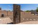 The backyard features an outdoor shower at 10735 E Kilarea Ave, Mesa, AZ 85209