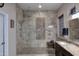 Elegant bathroom featuring a walk-in shower with tile and decorative accents at 1085 E Oakland Ct, Gilbert, AZ 85295