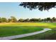 Expansive green space with walking path and lush landscaping, perfect for outdoor activities at 1085 E Oakland Ct, Gilbert, AZ 85295