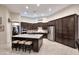 Spacious kitchen features a large center island, stainless steel appliances, and ample cabinetry at 1085 E Oakland Ct, Gilbert, AZ 85295