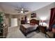 Cozy main bedroom with carpet, stylish furniture, and ample natural light at 1085 E Oakland Ct, Gilbert, AZ 85295