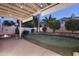 Backyard putting green perfect for practice and outdoor enjoyment at 1085 E Oakland Ct, Gilbert, AZ 85295