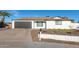 Charming single-story home with a well-maintained front yard and desert landscaping at 12043 N 46Th Ave, Glendale, AZ 85304
