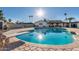 Backyard view showing a refreshing pool, patio, and well-manicured landscaping at 12043 N 46Th Ave, Glendale, AZ 85304