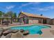 Relaxing backyard oasis with a sparkling pool and lush greenery, perfect for enjoying outdoor living at 1245 W Cindy St, Chandler, AZ 85224