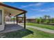 Beautiful backyard with covered patio, barbecue area, and lush lawn, ideal for outdoor entertaining at 1245 W Cindy St, Chandler, AZ 85224