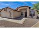 Charming single-story home featuring a tile roof, stucco exterior, and well-maintained landscaping at 1245 W Cindy St, Chandler, AZ 85224