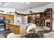 Living area featuring a granite countertop kitchen island and cozy living room at 1245 W Cindy St, Chandler, AZ 85224