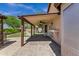 Spacious covered patio features brick pavers and outdoor ceiling fans, offering a shady retreat with backyard views at 1245 W Cindy St, Chandler, AZ 85224