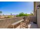 Enjoy panoramic views from this cozy balcony with rocking chairs and a bench at 1451 E South Fork Dr, Phoenix, AZ 85048