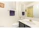 Cozy bathroom with bright lighting, single sink vanity, and glass door shower at 1451 E South Fork Dr, Phoenix, AZ 85048