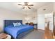 Spacious bedroom features vaulted ceiling, a window, and a ceiling fan at 1451 E South Fork Dr, Phoenix, AZ 85048