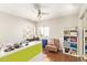 Well-lit bedroom features a desk and closet with sliding mirror doors at 1451 E South Fork Dr, Phoenix, AZ 85048