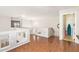 The hallway features wood floors, neutral walls and bright, natural light at 1451 E South Fork Dr, Phoenix, AZ 85048