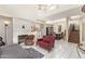 Bright living room with fireplace, large windows, and open layout at 1451 E South Fork Dr, Phoenix, AZ 85048