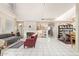 Bright living room with fireplace, large windows, and open layout at 1451 E South Fork Dr, Phoenix, AZ 85048