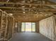 Open-concept interior framing with insulation, highlighting the spaciousness and natural light at 18224 W La Senda Dr, Surprise, AZ 85387
