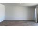 Bright and airy living room with tile floors offering a blank canvas for your design ideas at 18240 W La Senda Dr, Surprise, AZ 85387
