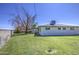Lush backyard with mature trees and ample space for outdoor activities at 1917 W Ashland Ave, Phoenix, AZ 85009
