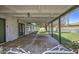 This covered patio offers an outdoor retreat with views of the backyard, perfect for relaxing or entertaining guests at 1917 W Ashland Ave, Phoenix, AZ 85009