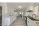 Bright, open kitchen flowing into the dining area, perfect for entertaining and Gathering gatherings at 1917 W Ashland Ave, Phoenix, AZ 85009