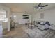Spacious living room with stylish decor, comfortable seating, and modern lighting for a cozy feel at 1917 W Ashland Ave, Phoenix, AZ 85009