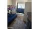 Shared bedroom with bunk beds, dresser and carpeted floors at 2301 E University Dr # 111, Mesa, AZ 85213