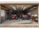 Inside of garage used for storage featuring block walls, finished ceiling, and vehicle parking at 255 N Hunt E Dr, Mesa, AZ 85203