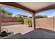 Covered backyard patio with brick pavers and views of the fenced yard at 2759 E Mews Rd, Gilbert, AZ 85298