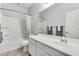 Clean bathroom with a tub shower and sink with vanity at 2759 E Mews Rd, Gilbert, AZ 85298