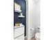 Elegant bathroom features floating shelves, modern fixtures, and a stylish, contemporary design at 2759 E Mews Rd, Gilbert, AZ 85298
