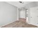 Spacious, carpeted bedroom with doorway and a hall closet at 2759 E Mews Rd, Gilbert, AZ 85298