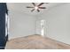 Bedroom featuring neutral walls, plush carpeting, ceiling fan, and ample natural light at 2759 E Mews Rd, Gilbert, AZ 85298