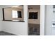 Bright room features a pass-through to the kitchen, allowing natural light to flood the space at 3802 W Mulberry Dr, Phoenix, AZ 85019