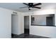 Living room with white walls, decorative tile flooring and a ceiling fan at 3802 W Mulberry Dr, Phoenix, AZ 85019