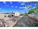 This property boasts a large backyard with block wall fencing at 4144 N 109Th Ave, Phoenix, AZ 85037