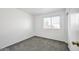 Clean bedroom with a carpet and window at 4144 N 109Th Ave, Phoenix, AZ 85037