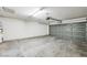This spacious garage is a blank canvas, ready to store vehicles and equipment at 4144 N 109Th Ave, Phoenix, AZ 85037