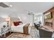 Bedroom with a brick fireplace, a large bed, and a seating area at 4243 E Avalon Dr, Phoenix, AZ 85018