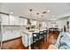 Bright and airy kitchen with a large central island, seamlessly flowing into the living area at 4243 E Avalon Dr, Phoenix, AZ 85018