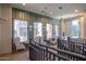 A stylish common area with chairs and tables for games or relaxation at 4803 N Woodmere Fairway -- # 1002, Scottsdale, AZ 85251